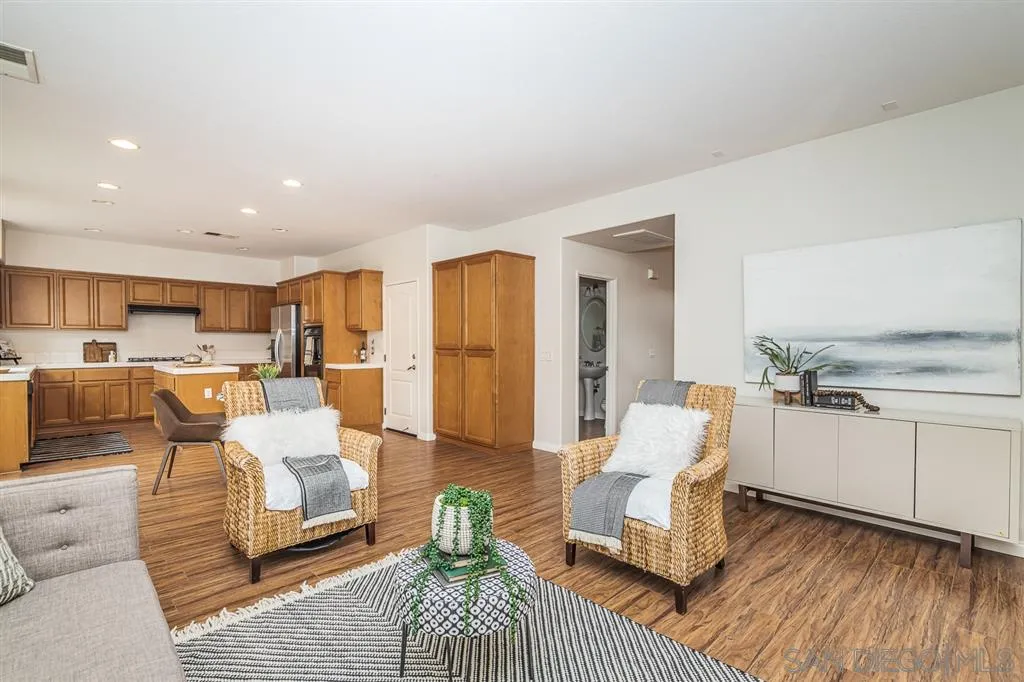1088 Greenway Road Oceanside, CA 92057 - Photo 8 of 25 a living room with furniture and a large window