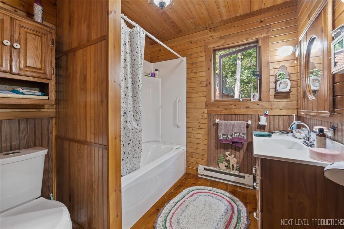 4002 East 1950th Road Sheridan, IL 60551 - Photo 11 of 35 a bathroom with a sink a toilet and shower