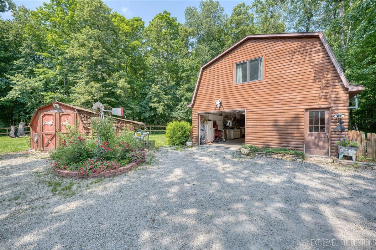 4002 East 1950th Road Sheridan, IL 60551 - Photo 17 of 35 a view of a house with a yard and plants
