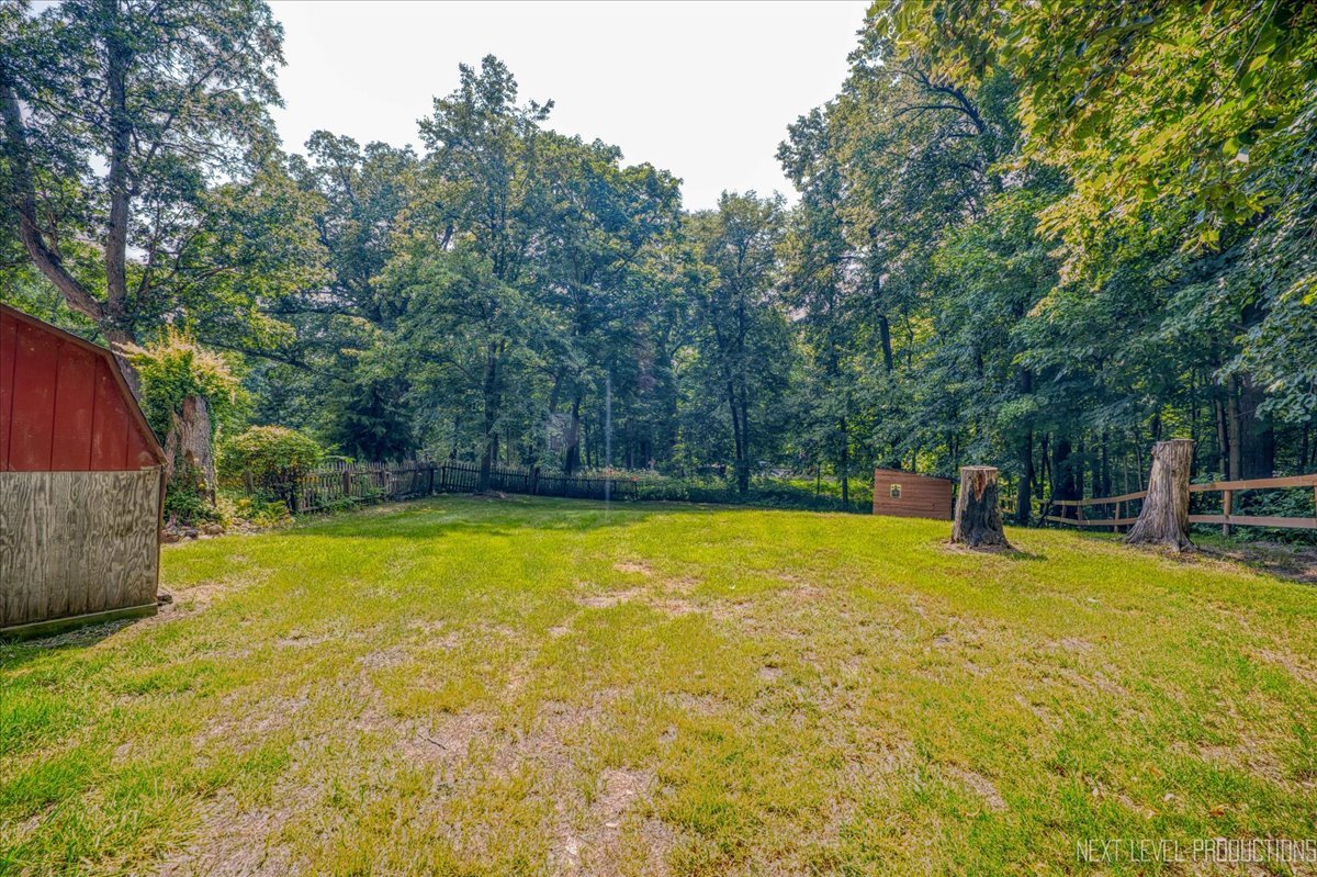 4002 East 1950th Road Sheridan, IL 60551 - Photo 26 of 35 a view of a swimming pool with an outdoor seating and a yard