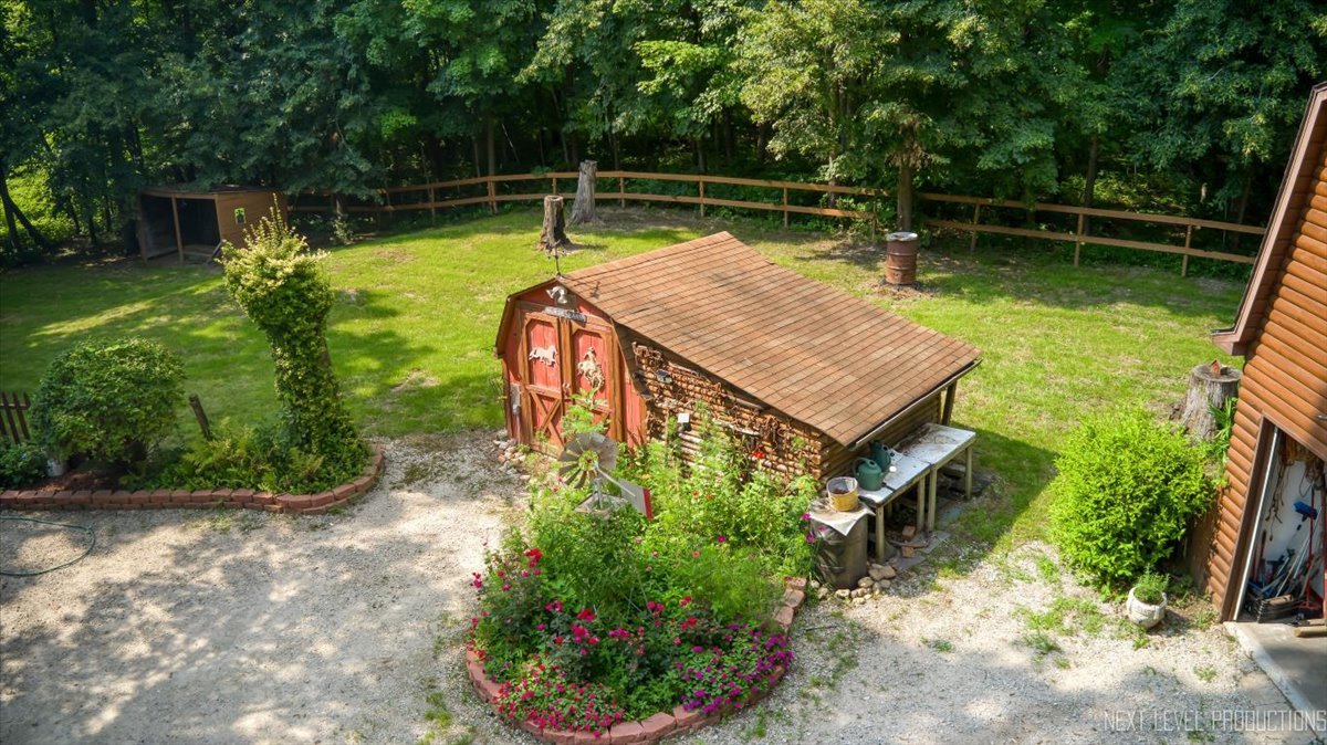 4002 East 1950th Road Sheridan, IL 60551 - Photo 28 of 35 a view of a swimming pool with a patio and a yard