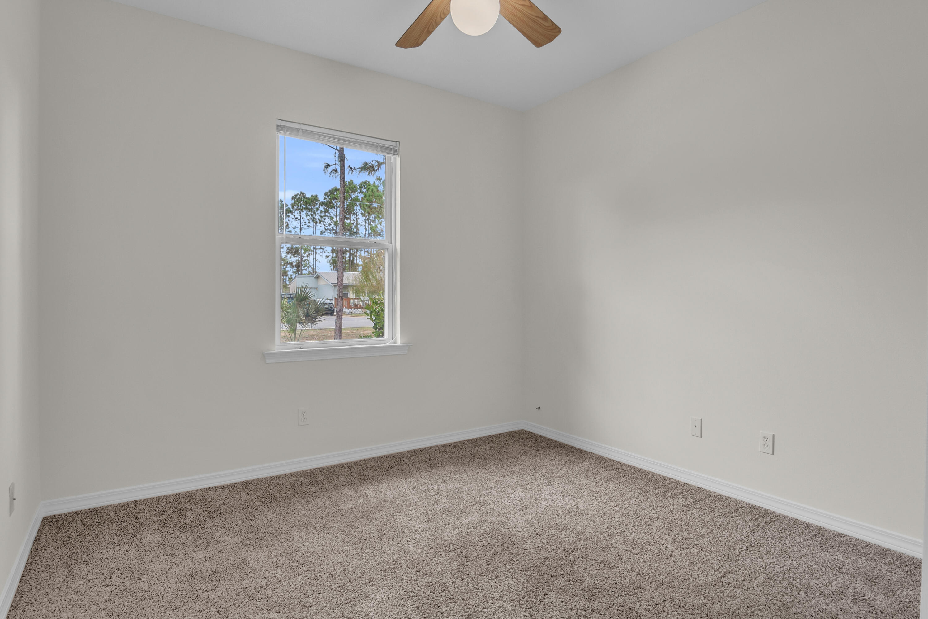 63 Las Roblas Grande Drive Santa Rosa Beach, FL 32459 - Photo 14 of 28 an empty room with a window