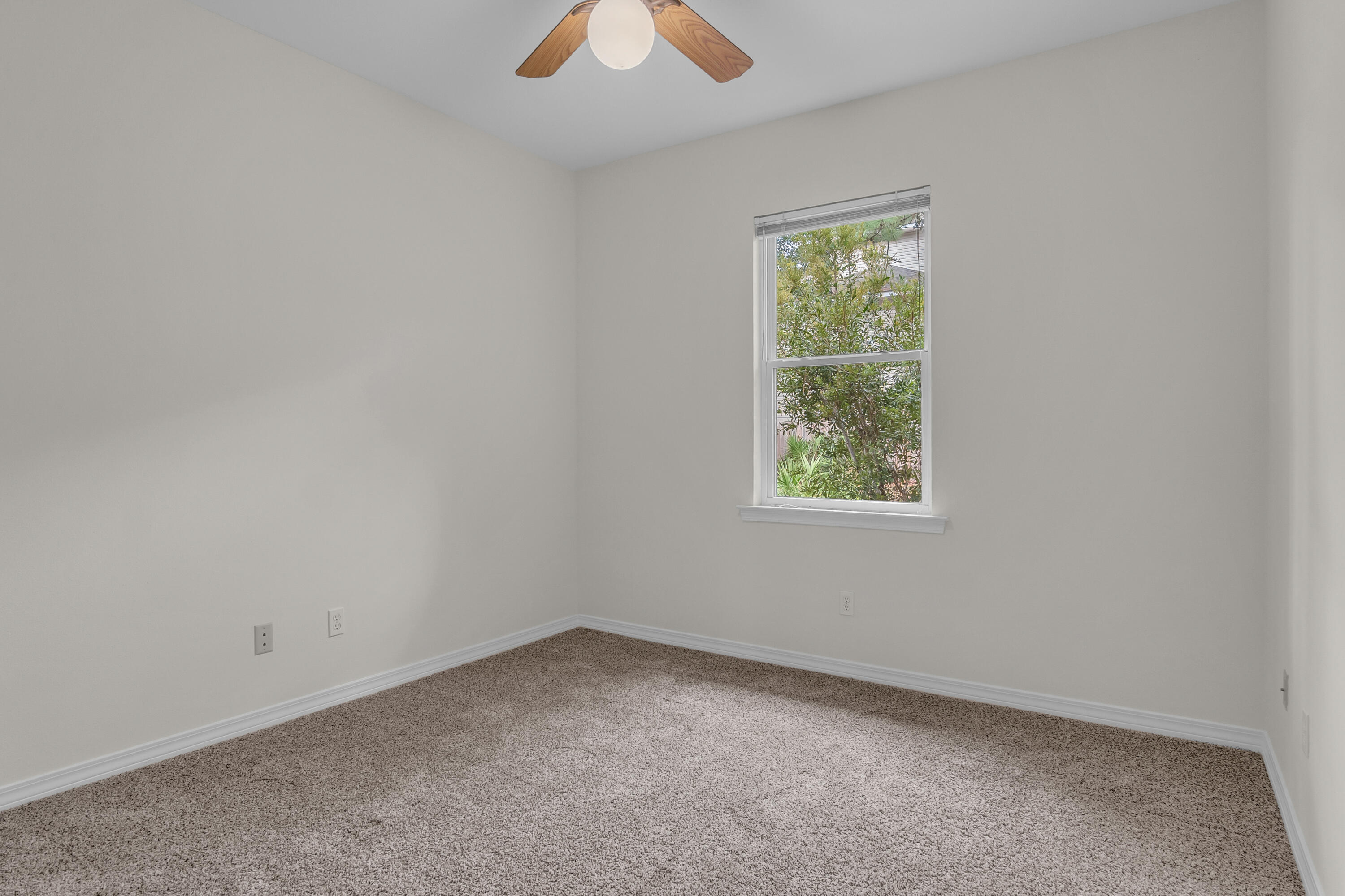 63 Las Roblas Grande Drive Santa Rosa Beach, FL 32459 - Photo 15 of 28 an empty room with a window