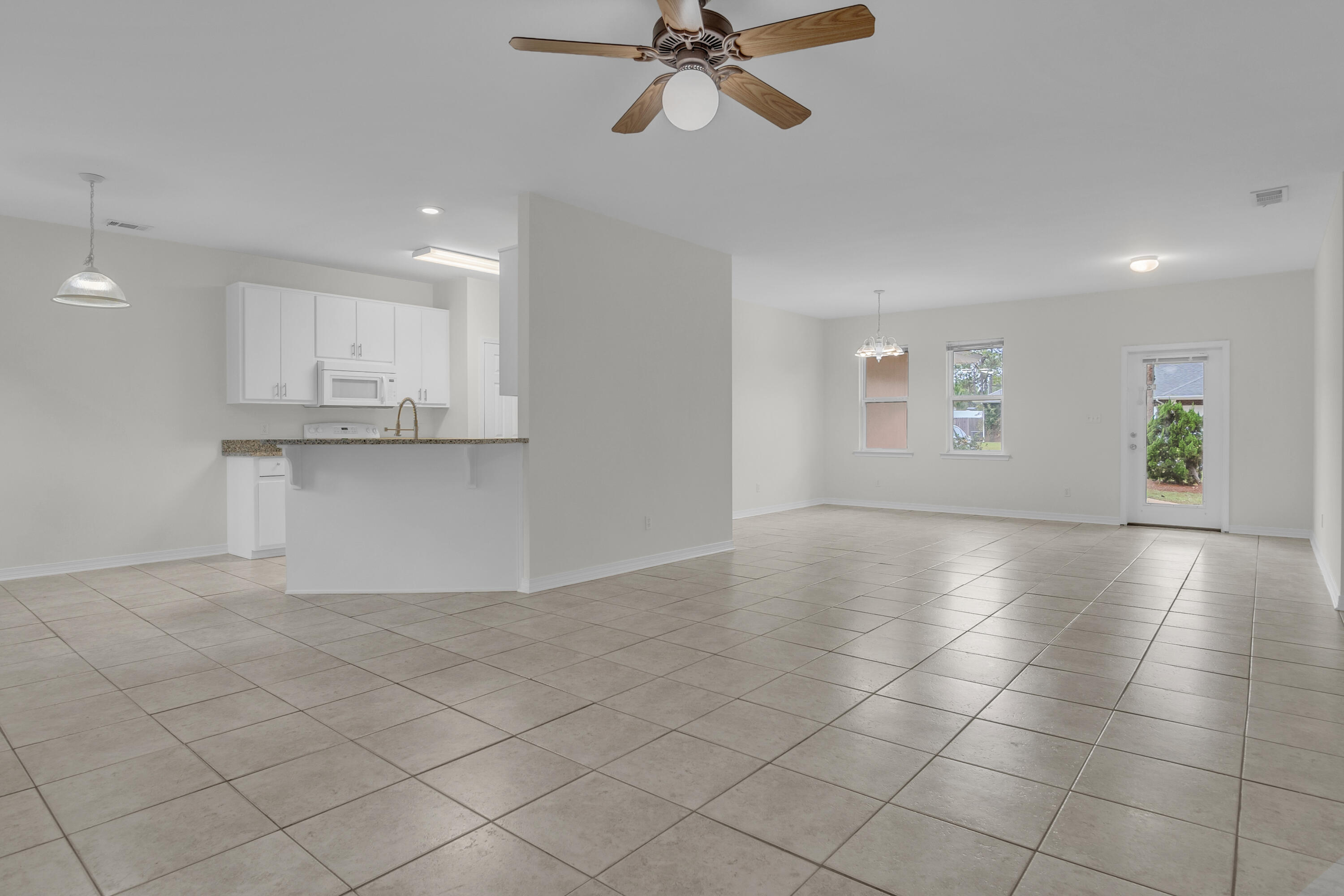 63 Las Roblas Grande Drive Santa Rosa Beach, FL 32459 - Photo 18 of 28 a view of a kitchen with a sink and cabinets