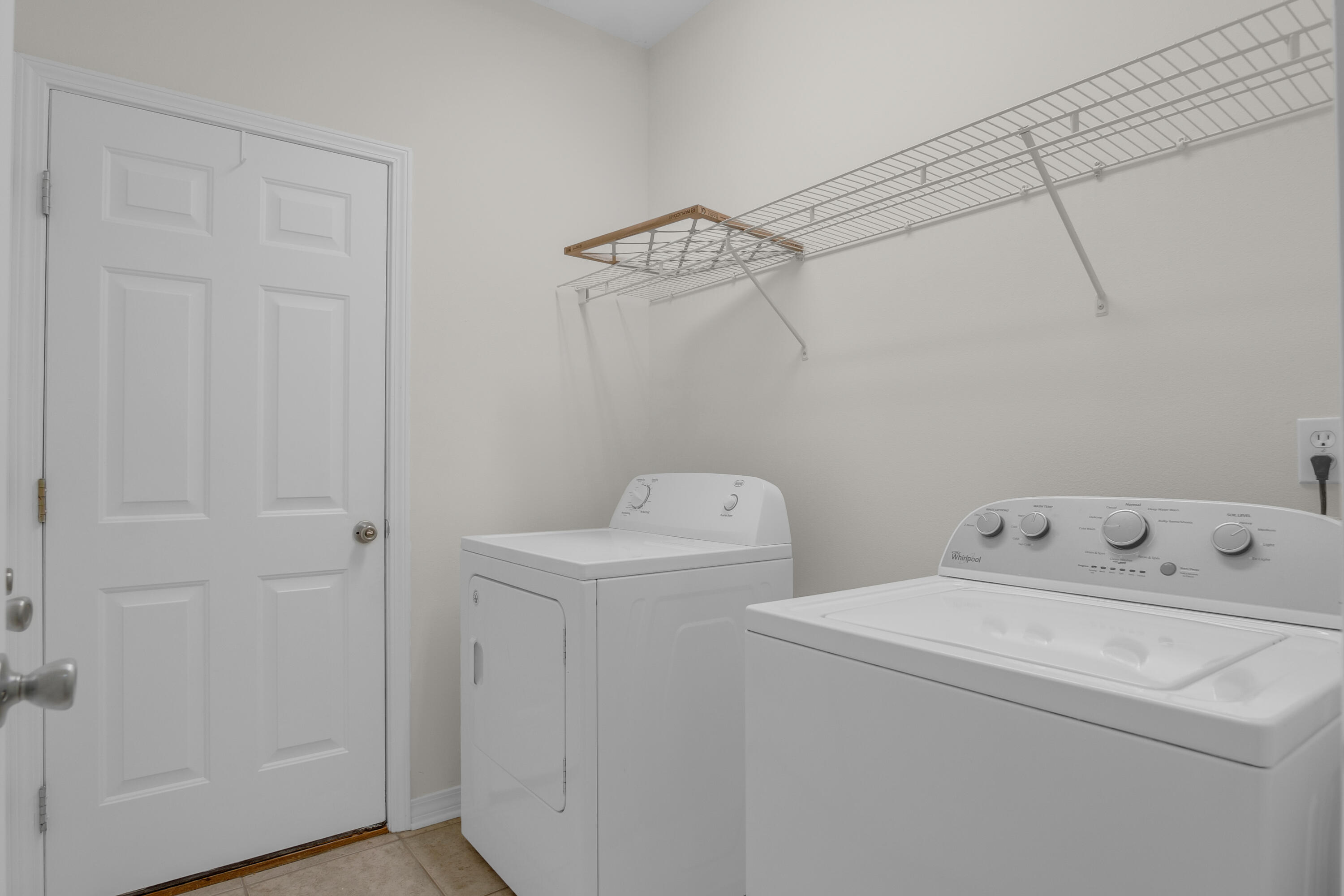 63 Las Roblas Grande Drive Santa Rosa Beach, FL 32459 - Photo 23 of 28 a utility room with dryer and washer