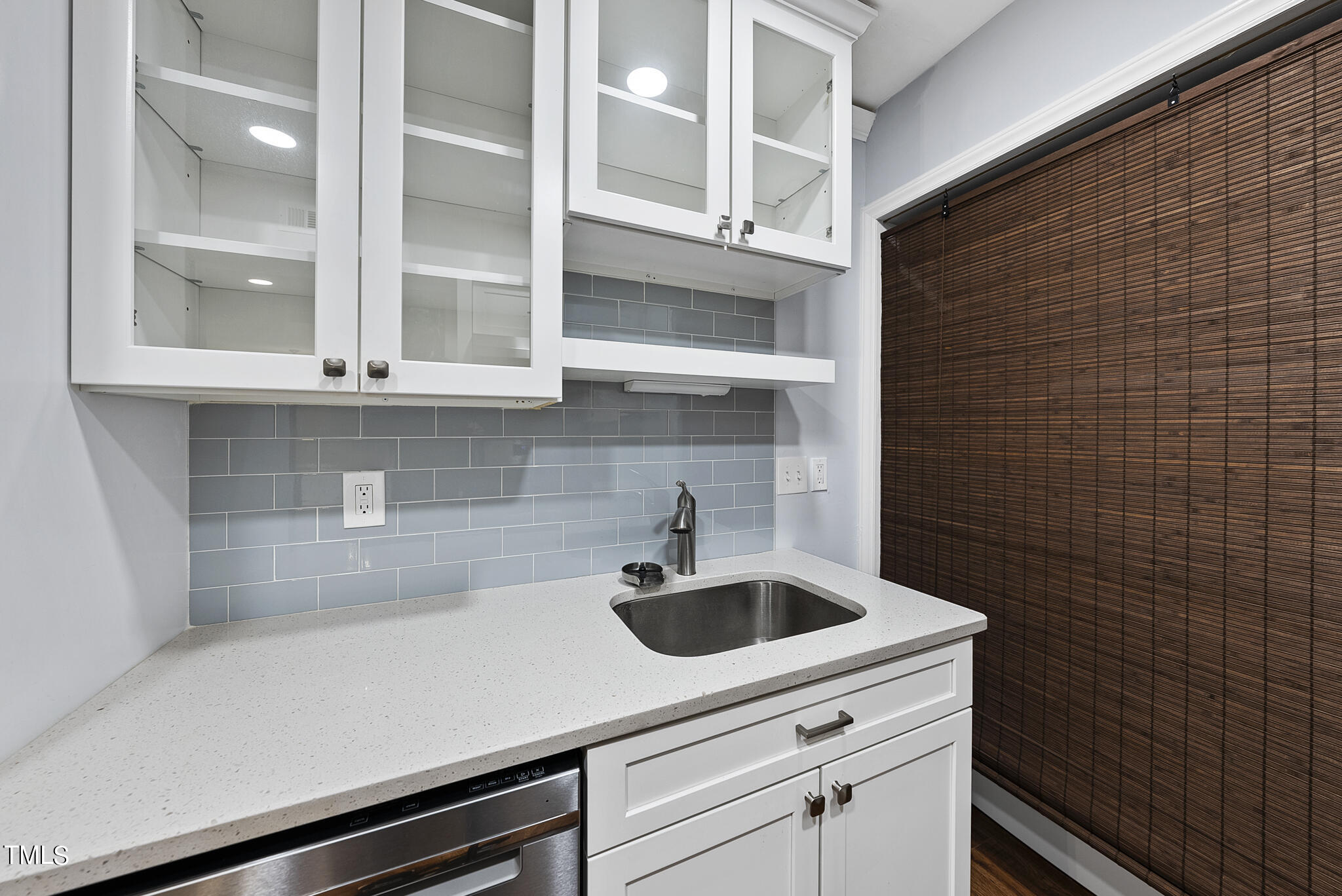 1309 Hillbrow Lane, Unit 103 Raleigh, NC 27615 - Photo 11 of 25 a kitchen with a sink and cabinets