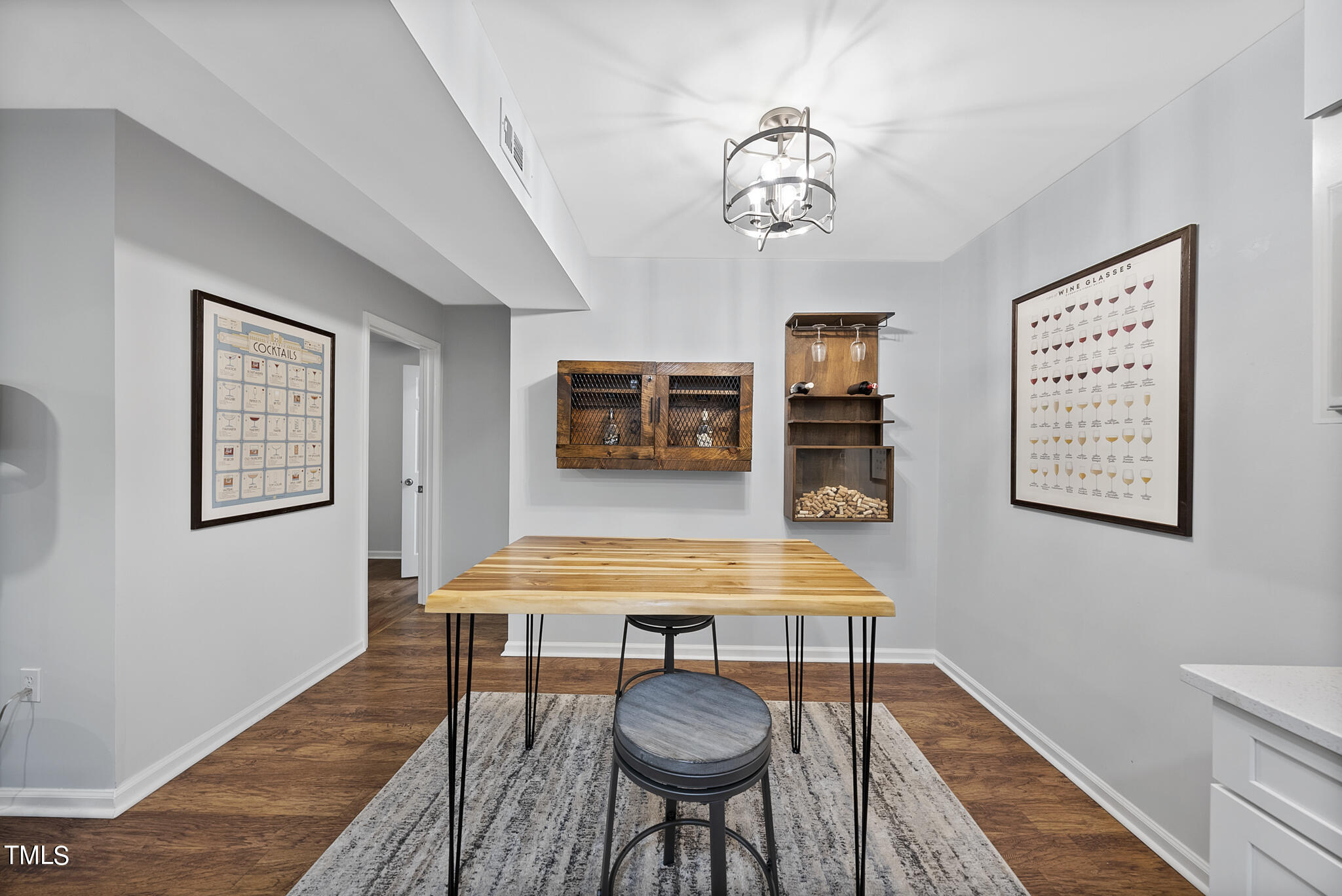 1309 Hillbrow Lane, Unit 103 Raleigh, NC 27615 - Photo 12 of 25 a living room with furniture and a table