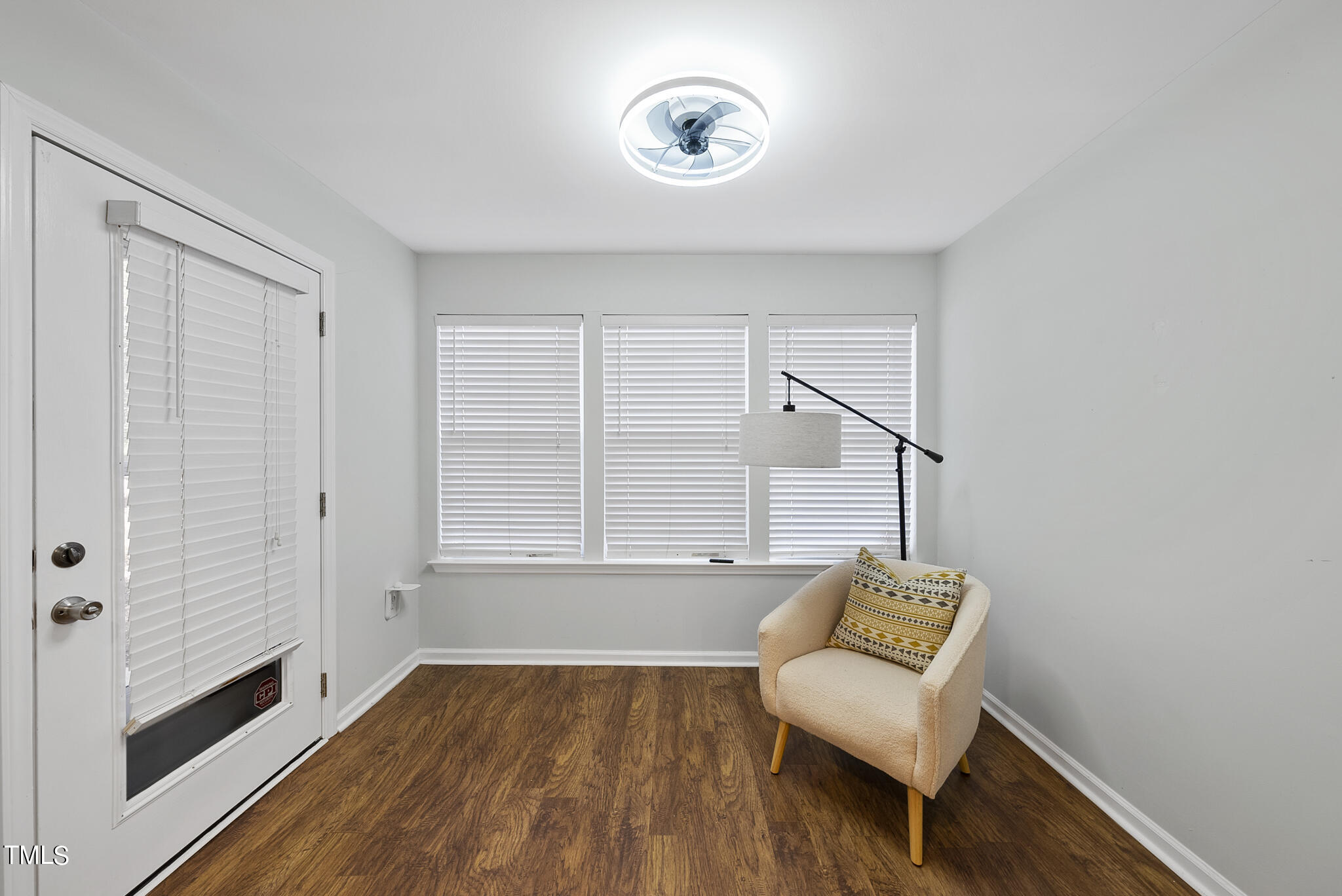 1309 Hillbrow Lane, Unit 103 Raleigh, NC 27615 - Photo 22 of 25 a view of room with stairs and wooden floor