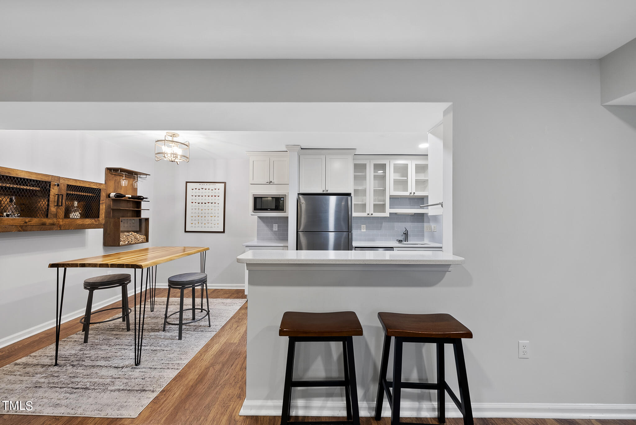 1309 Hillbrow Lane, Unit 103 Raleigh, NC 27615 - Photo 7 of 25 a dining room with furniture and window