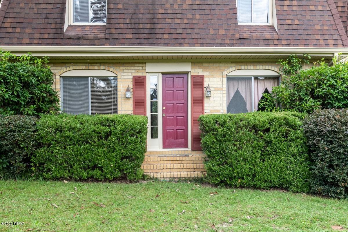 6663 Goodall Mill Road Macon, GA 31216 - Photo 2 of 31 a front view of a house with a yard