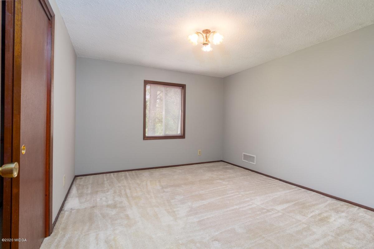 6663 Goodall Mill Road Macon, GA 31216 - Photo 15 of 31 an empty room with windows