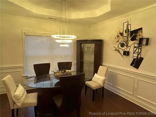 a laptop computer sitting on top of a table