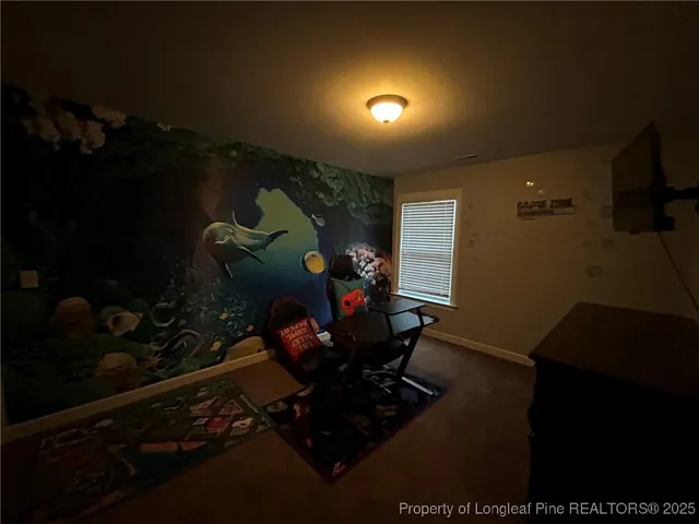 a room with wooden floor and outdoor seating