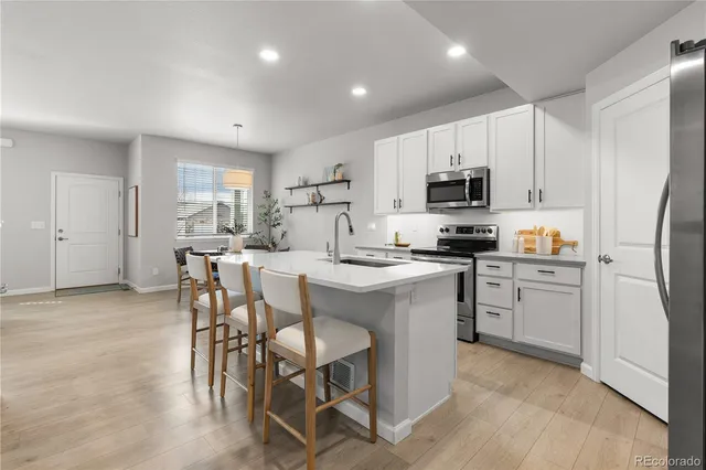 $325,000 | 2661 Stage Coach Drive, Unit C, Milliken, CO 80543