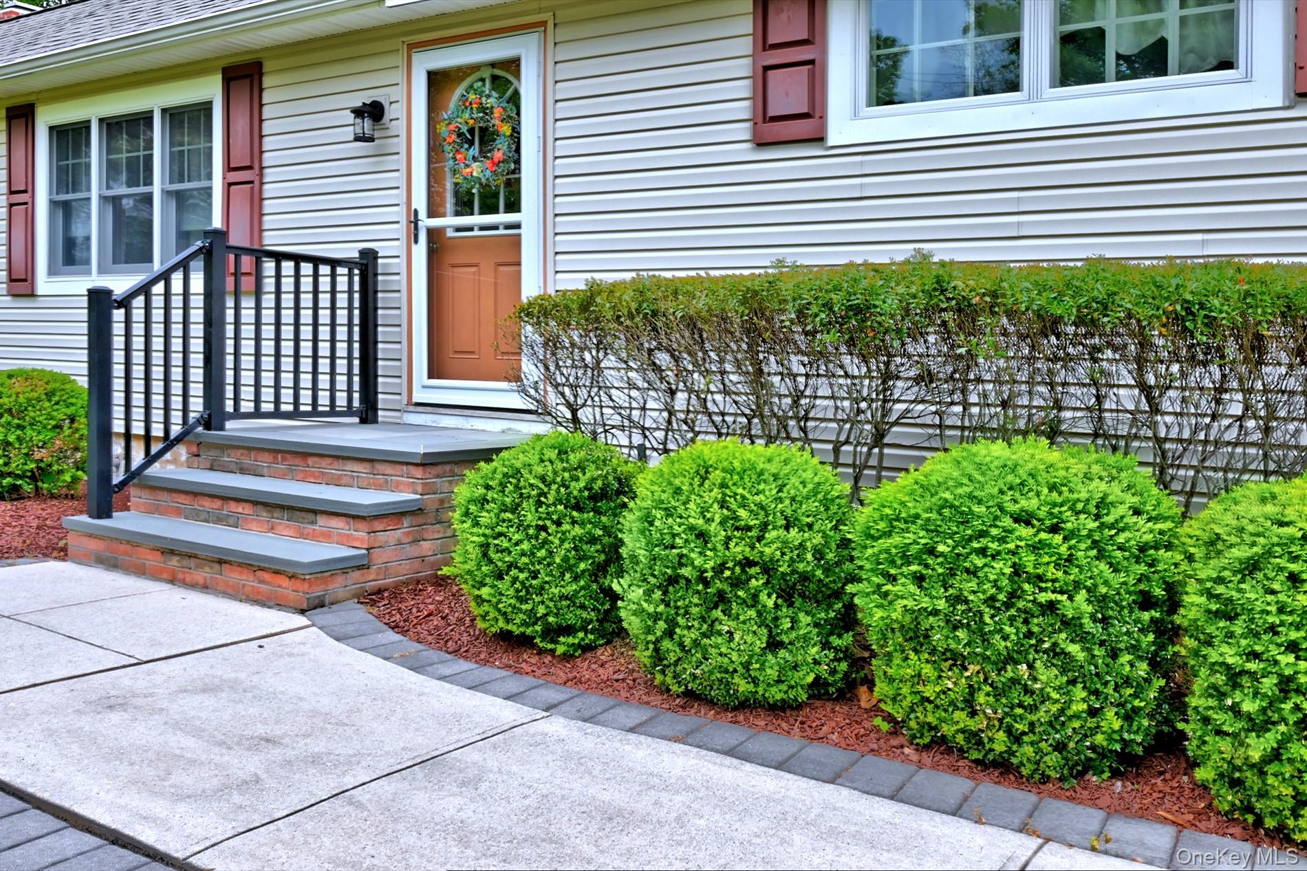 20 Valentine Road Shoreham, NY 11786 - Photo 3 of 39 Pavers on the Walk way around to the Garage and the Back of the House