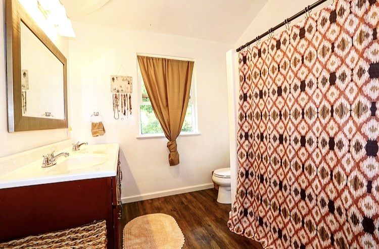 1001 Kauhikoa Road Haiku, HI 96708 - Photo 22 of 30 a bathroom with a sink toilet and shower