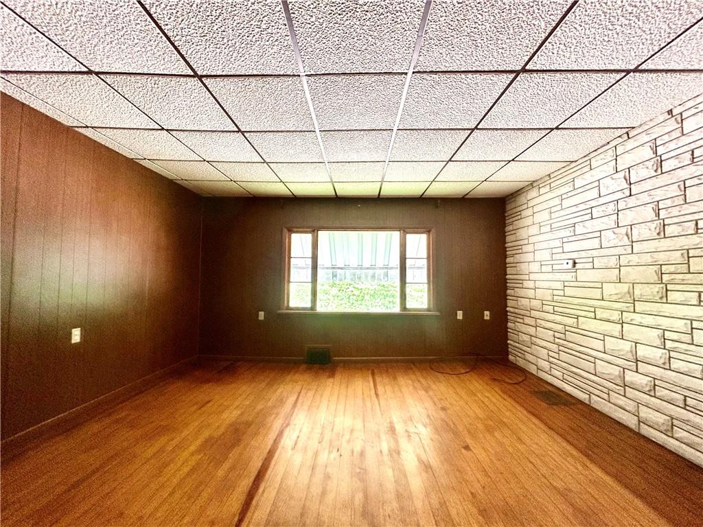 301 4th Street Allison, PA 15413 - Photo 11 of 29 a view of empty room with wooden floor and fan