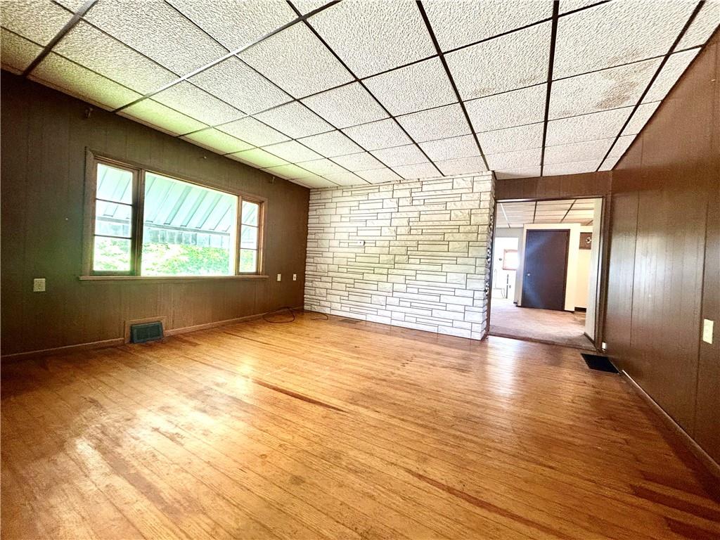 301 4th Street Allison, PA 15413 - Photo 12 of 29 a view of empty room with wooden floor and fan