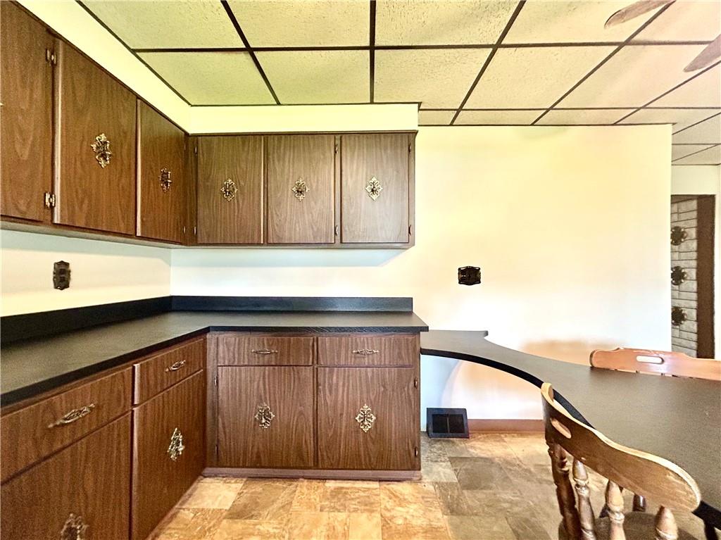 301 4th Street Allison, PA 15413 - Photo 4 of 29 a kitchen with a sink and cabinets