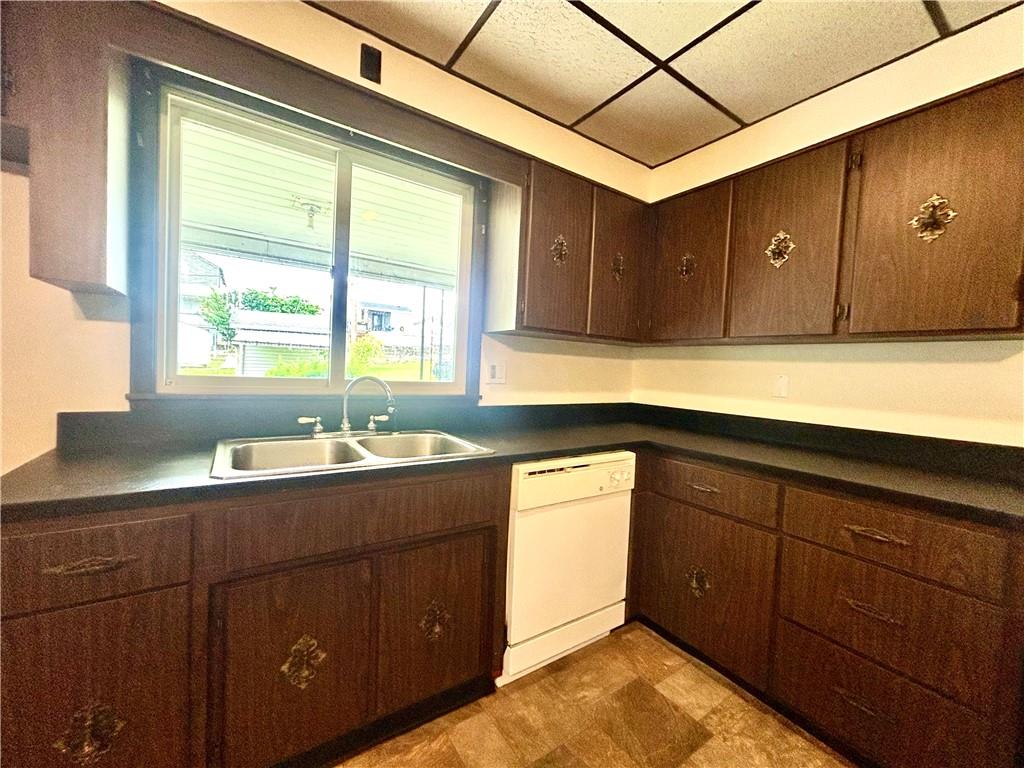 301 4th Street Allison, PA 15413 - Photo 5 of 29 a kitchen with a sink and cabinets