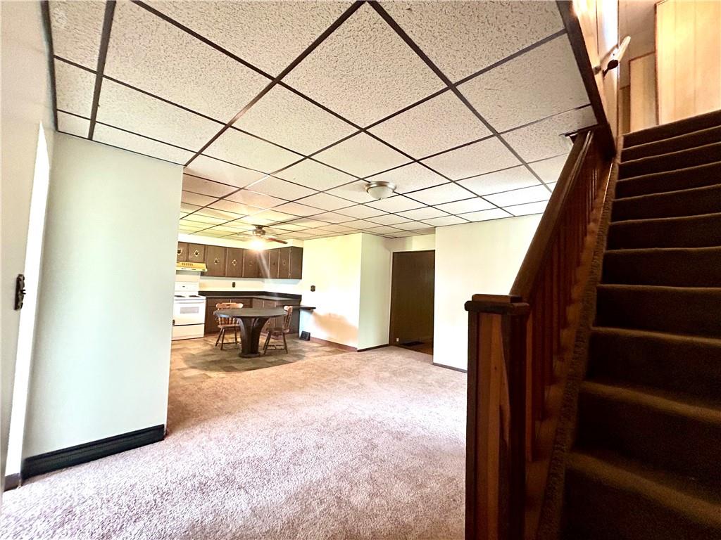 301 4th Street Allison, PA 15413 - Photo 7 of 29 a view of a livingroom with furniture and staircase