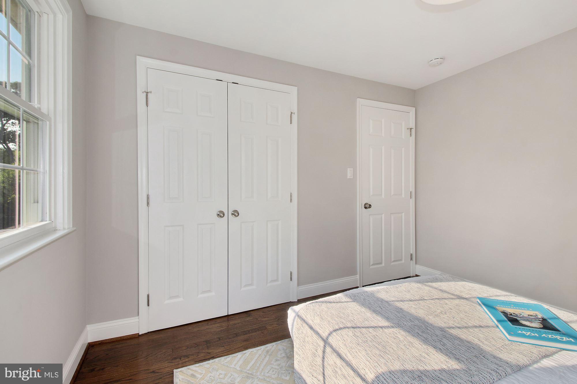 7003 Kenleigh Road Baltimore, MD 21212 - Photo 16 of 28 a bedroom with a bed and a window