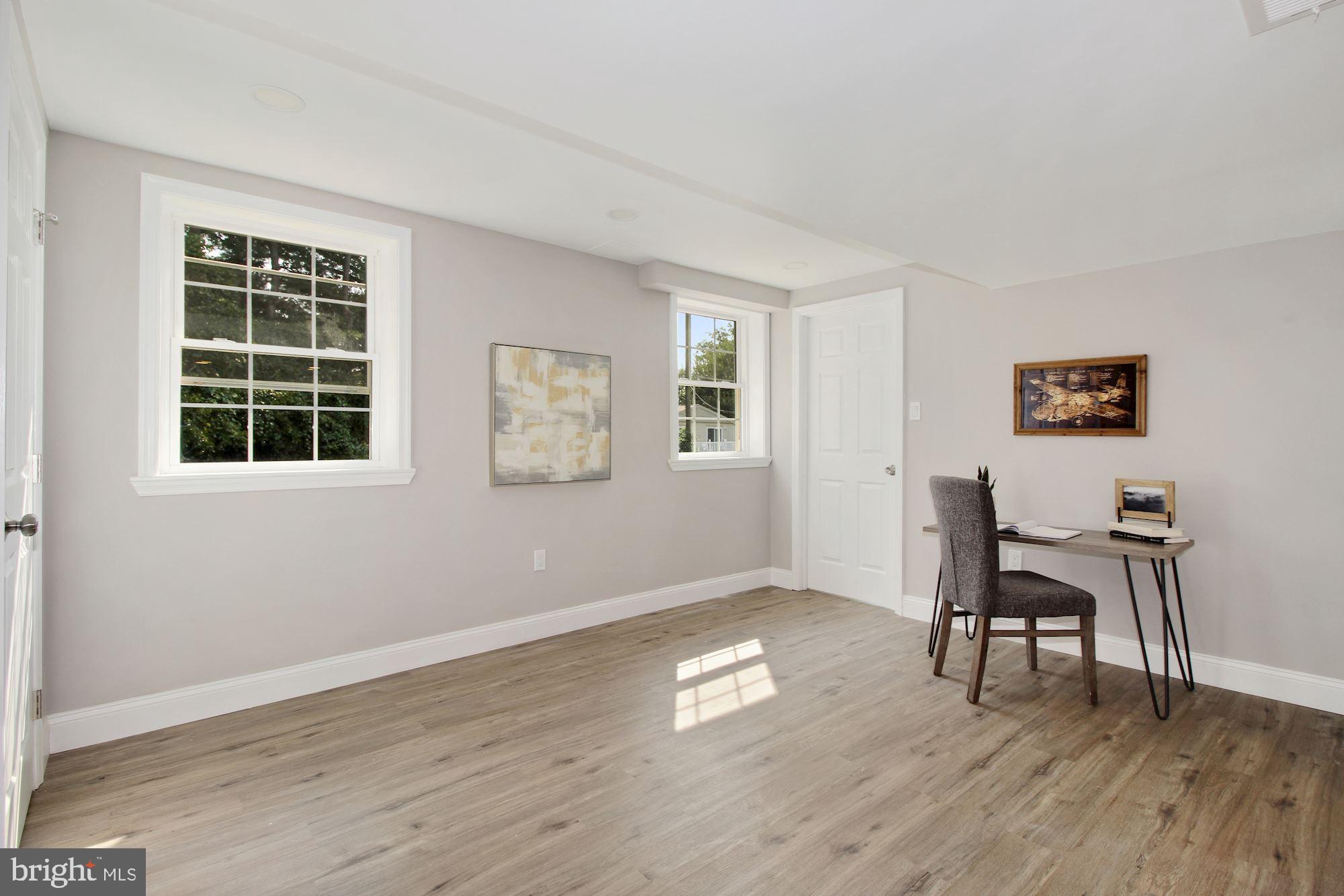 7003 Kenleigh Road Baltimore, MD 21212 - Photo 21 of 28 a workspace with wooden floor and a window