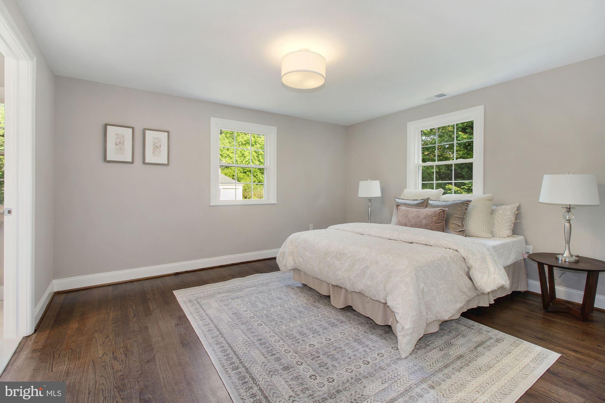 7003 Kenleigh Road Baltimore, MD 21212 - Photo 8 of 28 a bedroom with a bed and a window