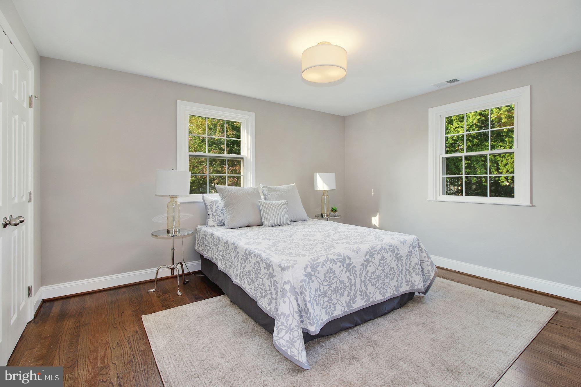 7003 Kenleigh Road Baltimore, MD 21212 - Photo 10 of 28 a bedroom with a bed and a window