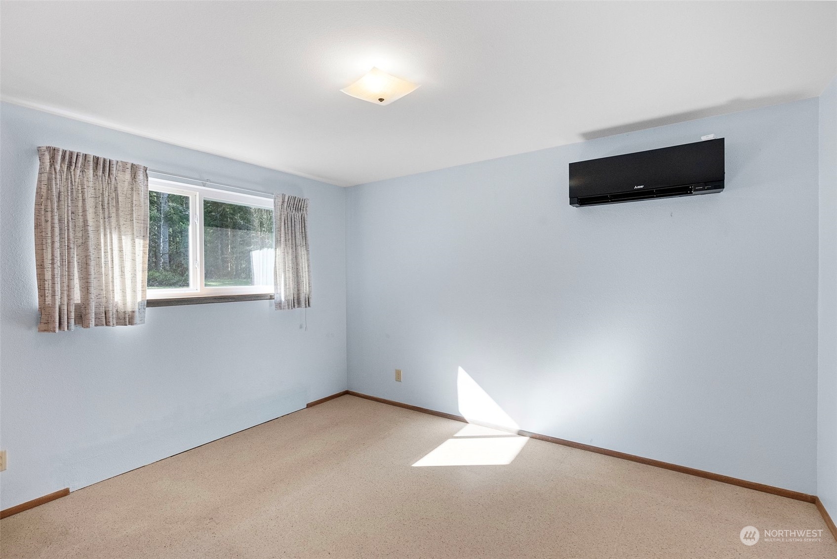 44223 Southeast Ernies Grove Road Snoqualmie, WA 98065 - Photo 12 of 21 an empty room with windows