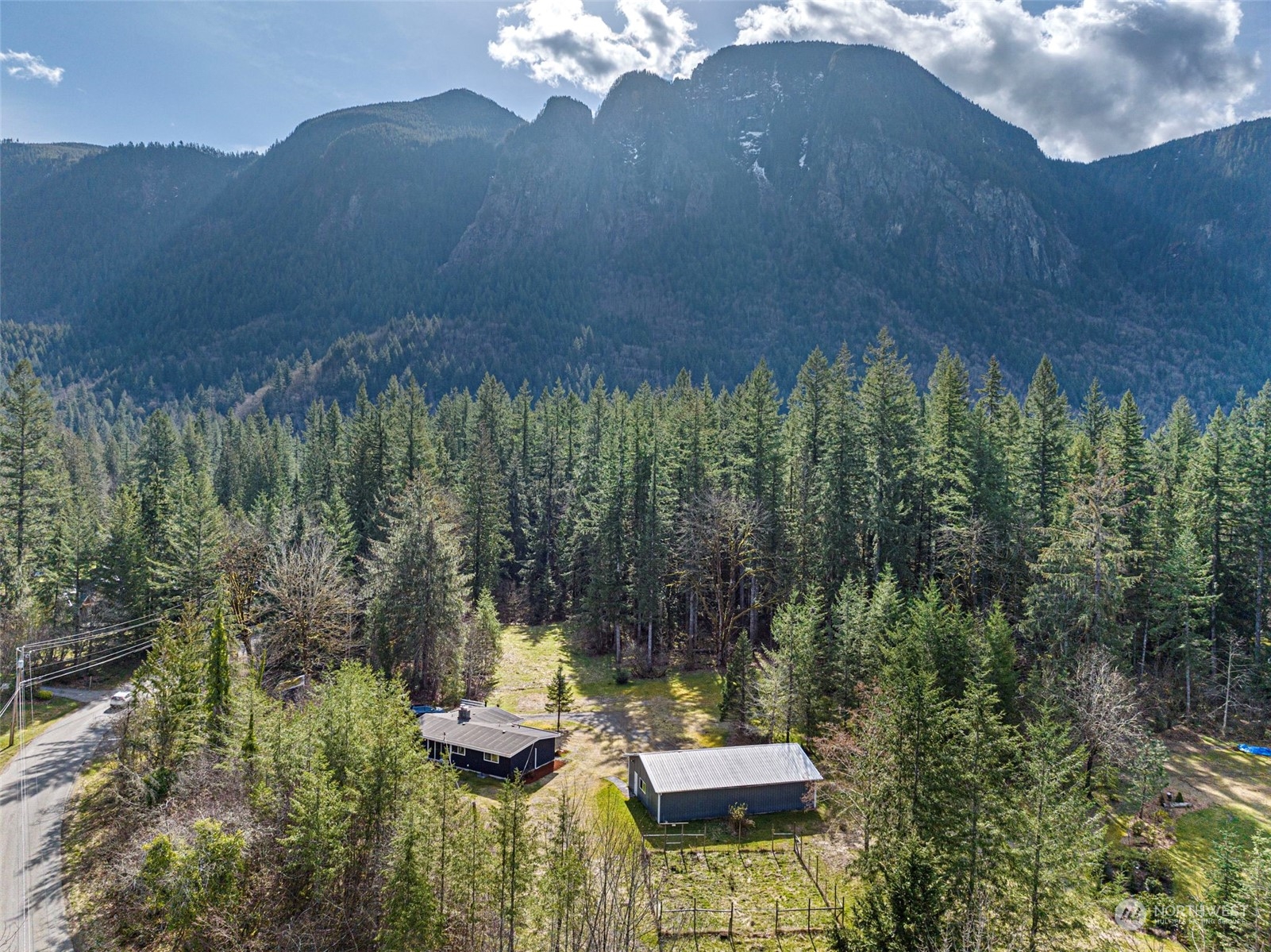 44223 Southeast Ernies Grove Road Snoqualmie, WA 98065 - Photo 3 of 21 a view of a couches in the patio