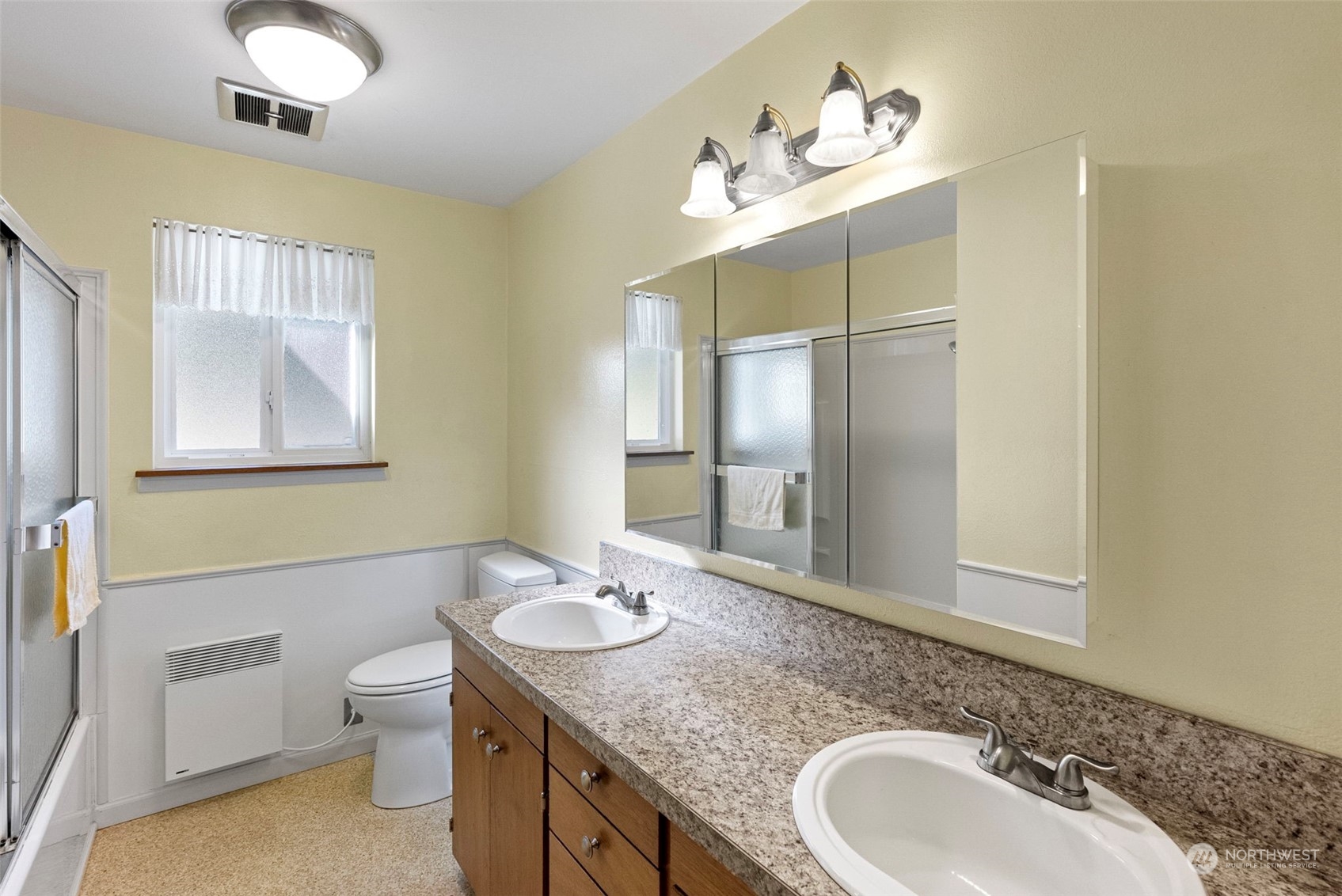 44223 Southeast Ernies Grove Road Snoqualmie, WA 98065 - Photo 8 of 21 a bathroom with a granite countertop double vanity sink mirror and toilet
