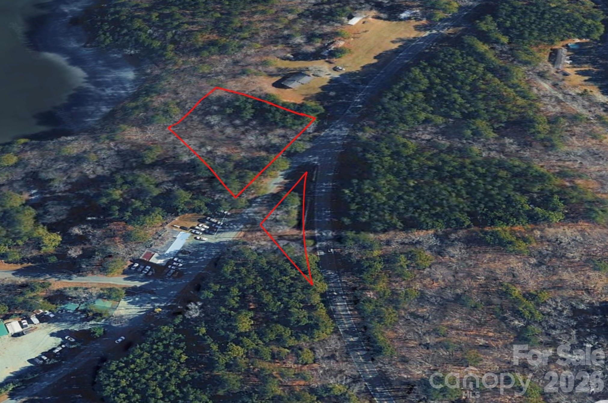 2837 Lystra Road Chapel Hill, NC 27517 - Photo 3 of 3 a aerial view of houses with outdoor space