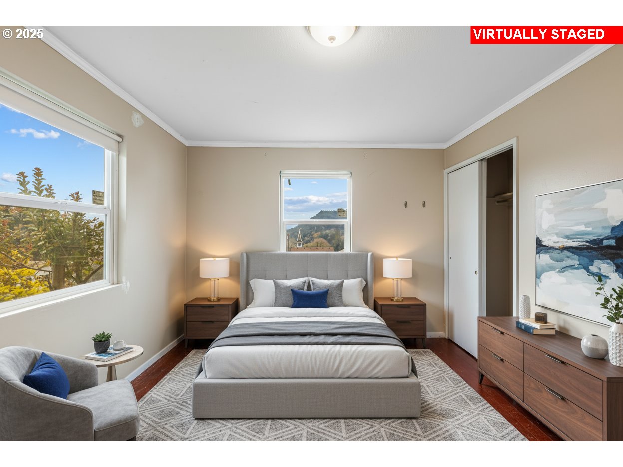 532 2nd Street Elkton, OR 97436 - Photo 19 of 32 a bedroom with a bed and wooden floor