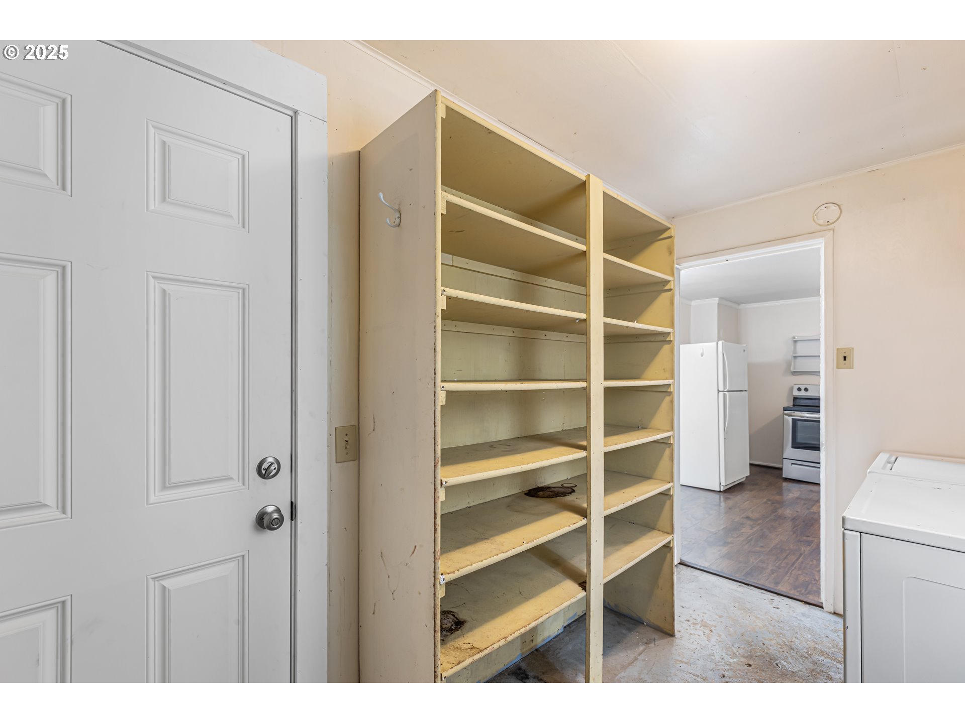 532 2nd Street Elkton, OR 97436 - Photo 28 of 32 a room with a furniture and a window