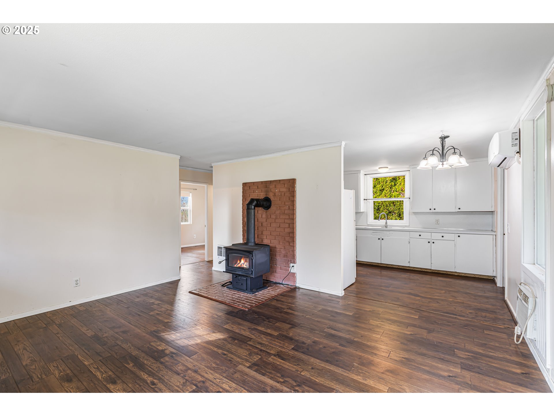 532 2nd Street Elkton, OR 97436 - Photo 9 of 32 a view of empty room with wooden floor