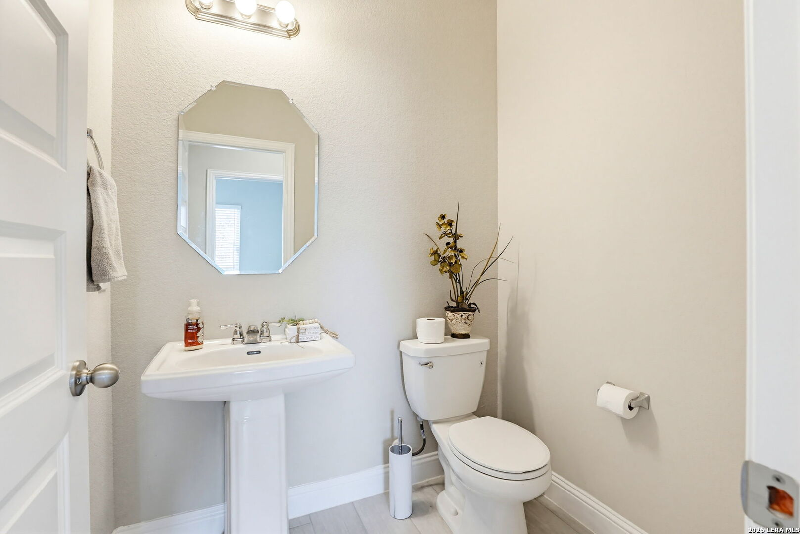 4174 Garden Path Marion, TX 78124 - Photo 20 of 21 a bathroom with a toilet sink and mirror
