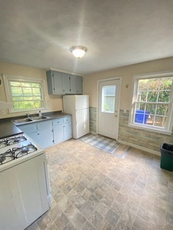 61 Arden Street Springfield, MA 01118 - Photo 8 of 19 a view of kitchen and windows