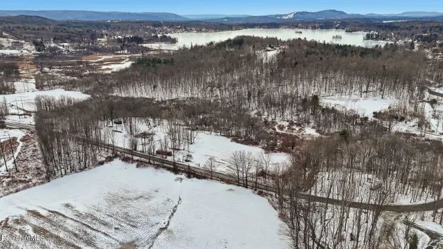 a view of a lake in middle of a city
