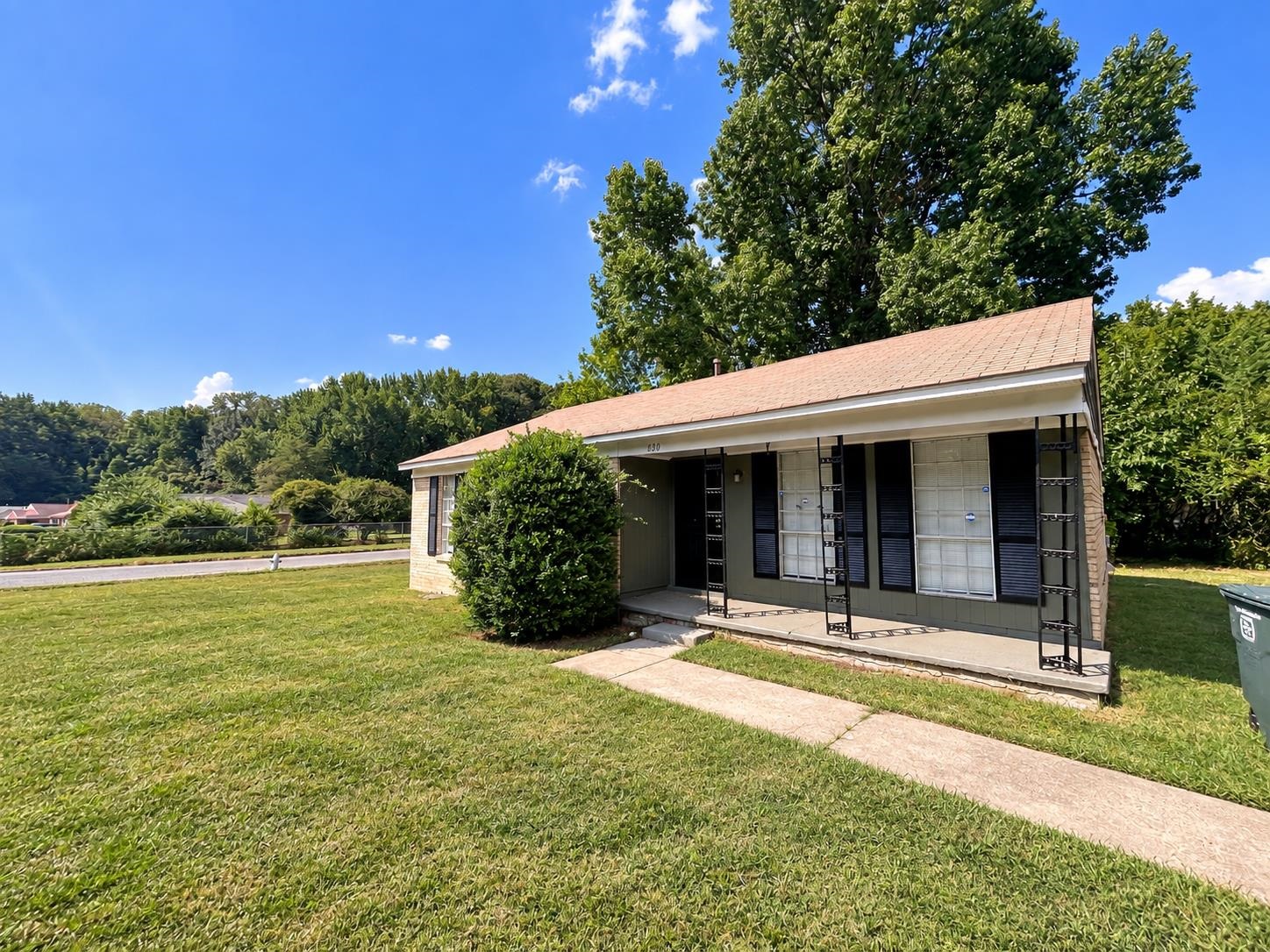 630 Blackhawk Road Memphis, TN 38109 - Photo 2 of 14 Brick veneer exterior with a covered porch featuring decorative metal columns
