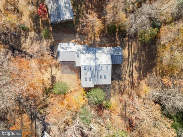 an aerial view of residential house with outdoor space