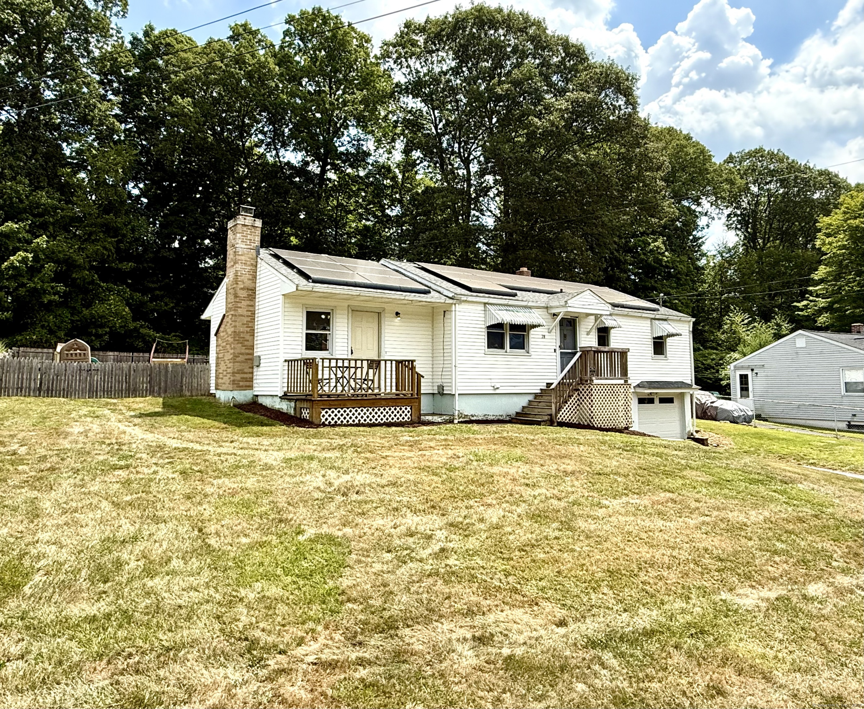 28 Charles Road Seymour, CT 06483 - Photo 1 of 1 a white house that has pool in front of it