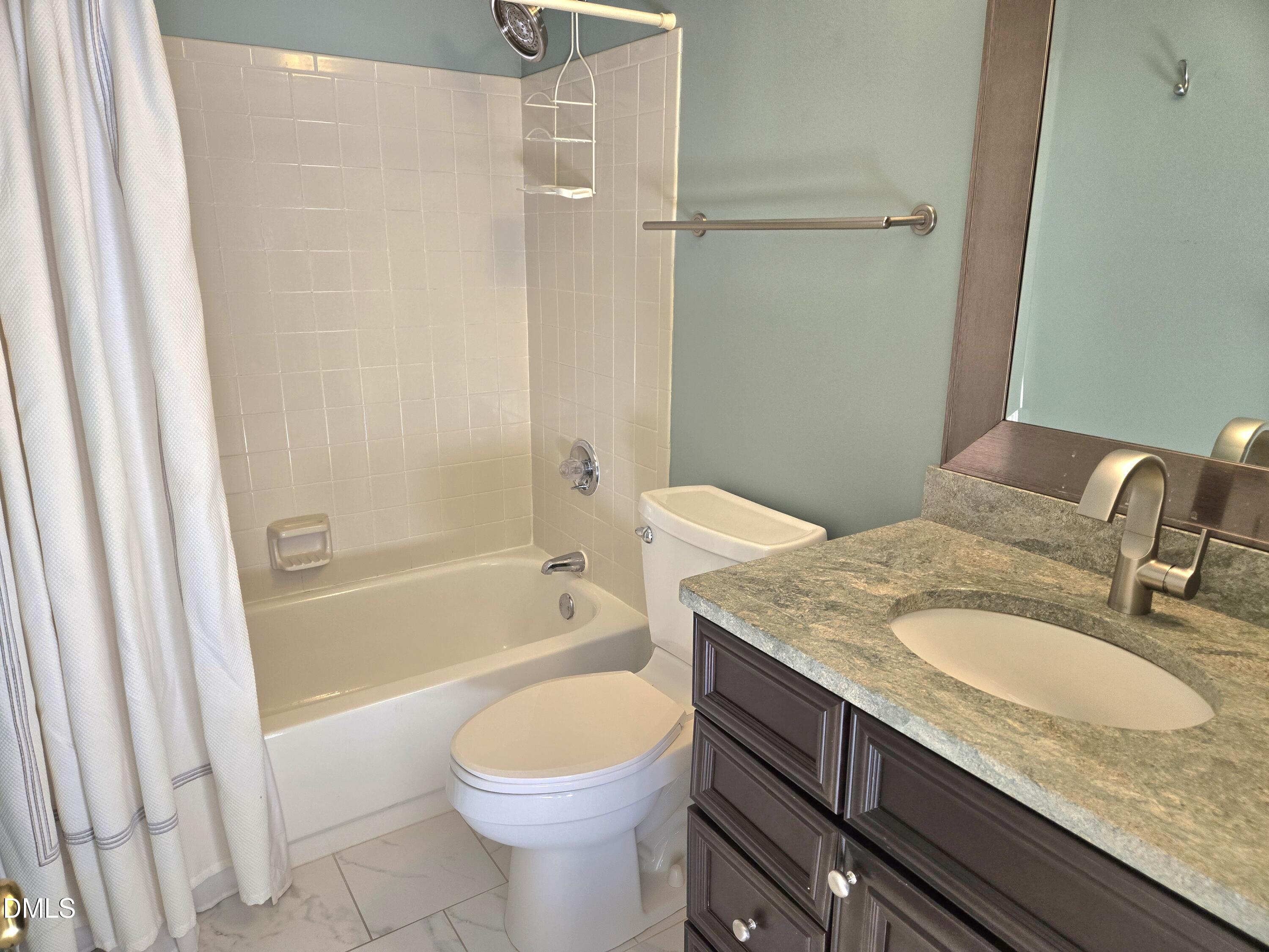 206 Cottage Lane Durham, NC 27713 - Photo 14 of 15 a bathroom with a granite countertop sink toilet and shower