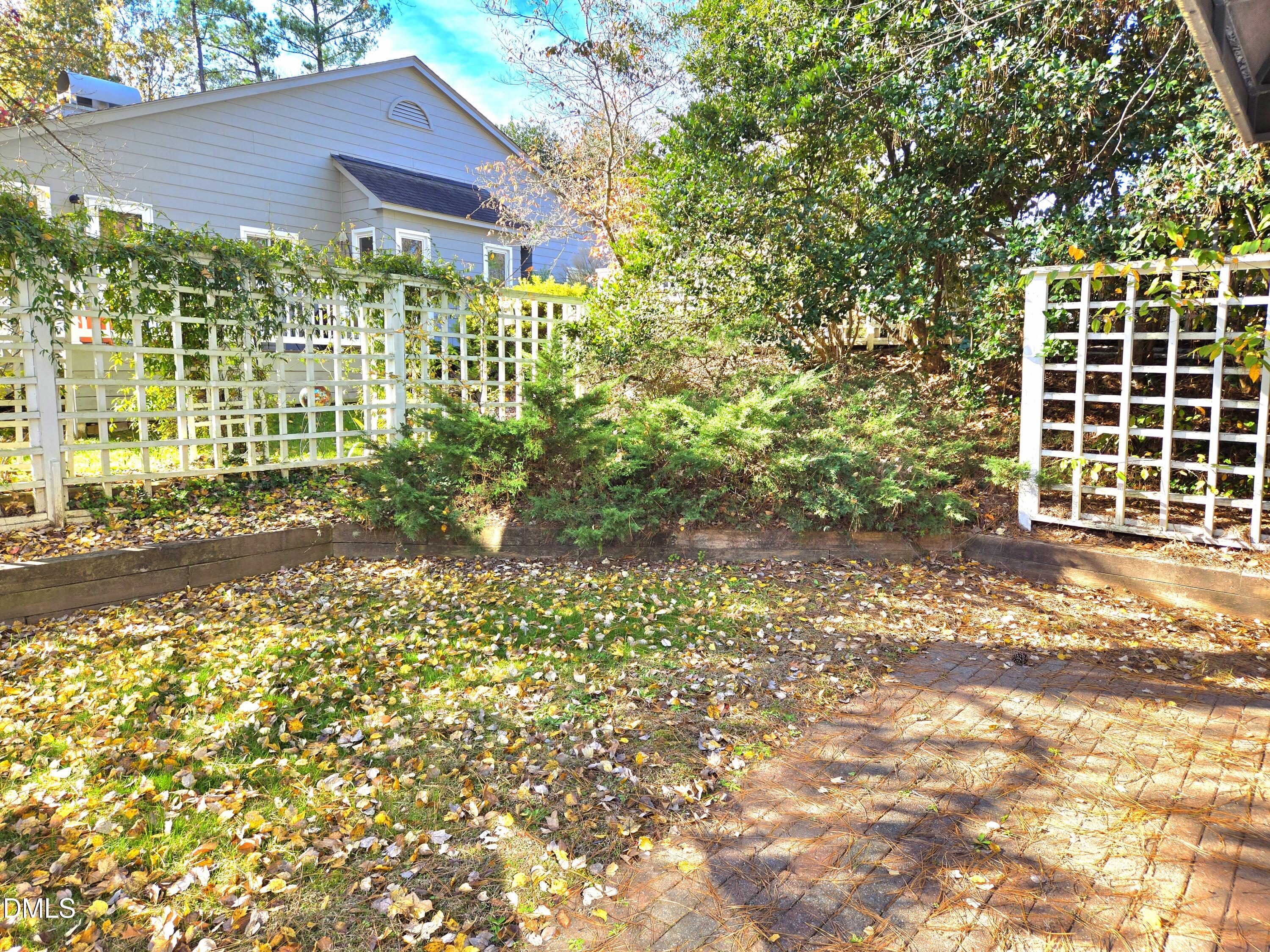 206 Cottage Lane Durham, NC 27713 - Photo 2 of 15 a view of a pathway of a house with a large tree