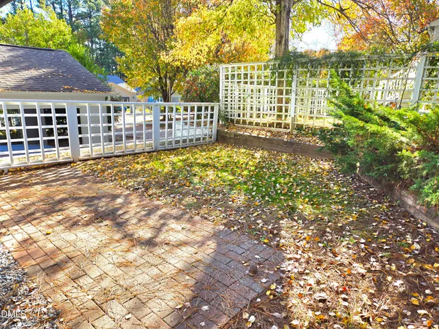 a view of house with a garden