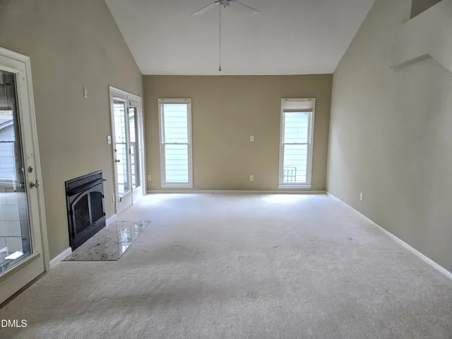 a view of livingroom with washer and dryer