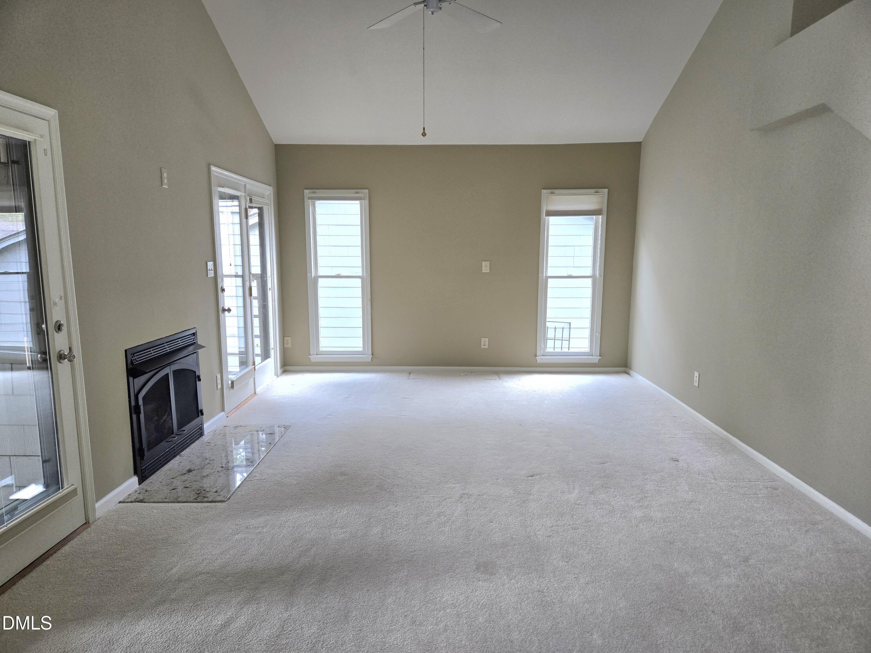 206 Cottage Lane Durham, NC 27713 - Photo 4 of 15 a view of livingroom with washer and dryer