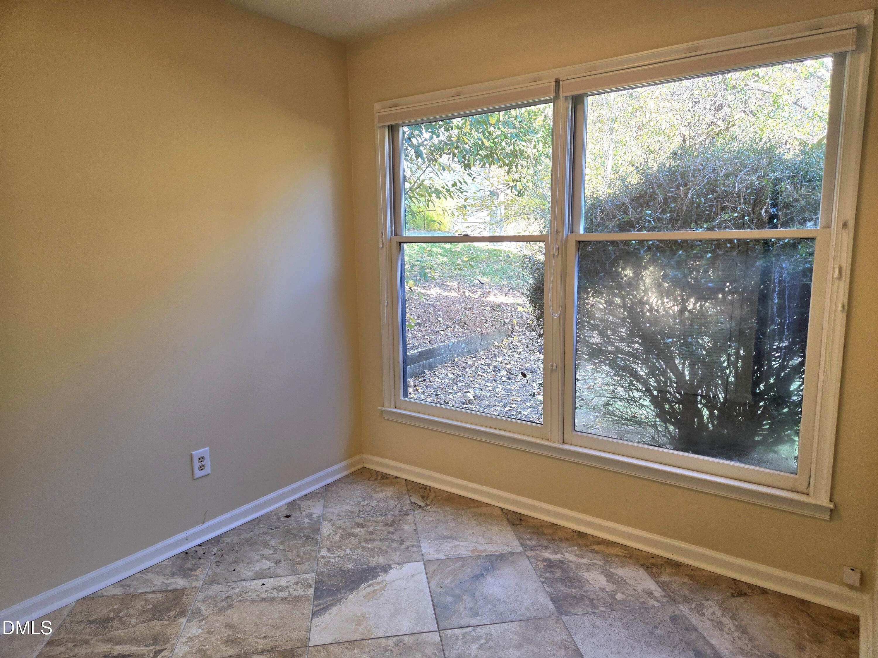 206 Cottage Lane Durham, NC 27713 - Photo 9 of 15 a view of a room with a large window