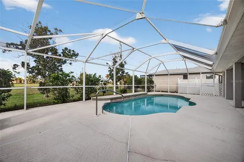 a view of a house with a swimming pool