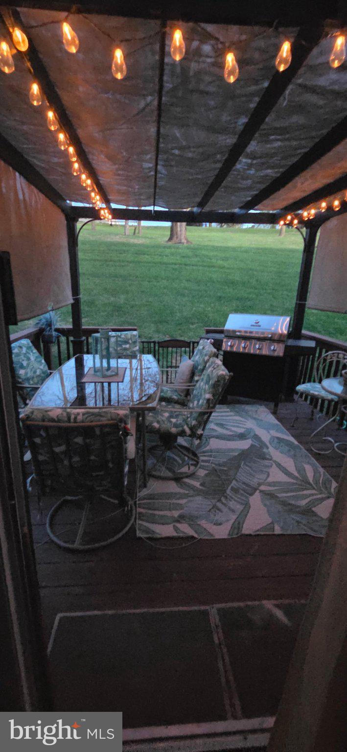102 Jason's Ridge Smithsburg, MD 21783 - Photo 27 of 31 Charming patio with twinkling lights.